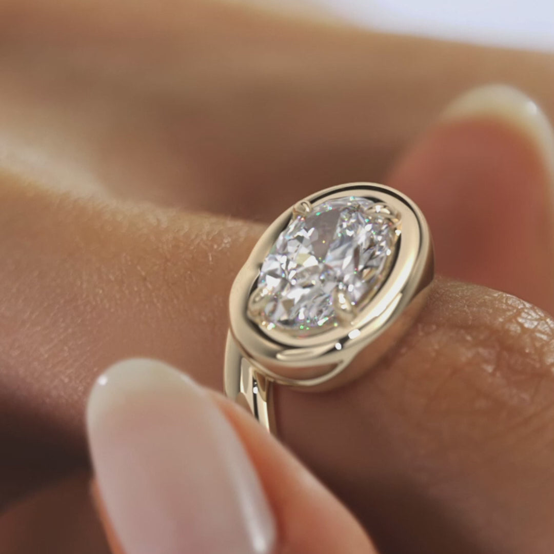 Chunky Oval Cut Collet Engagement Ring