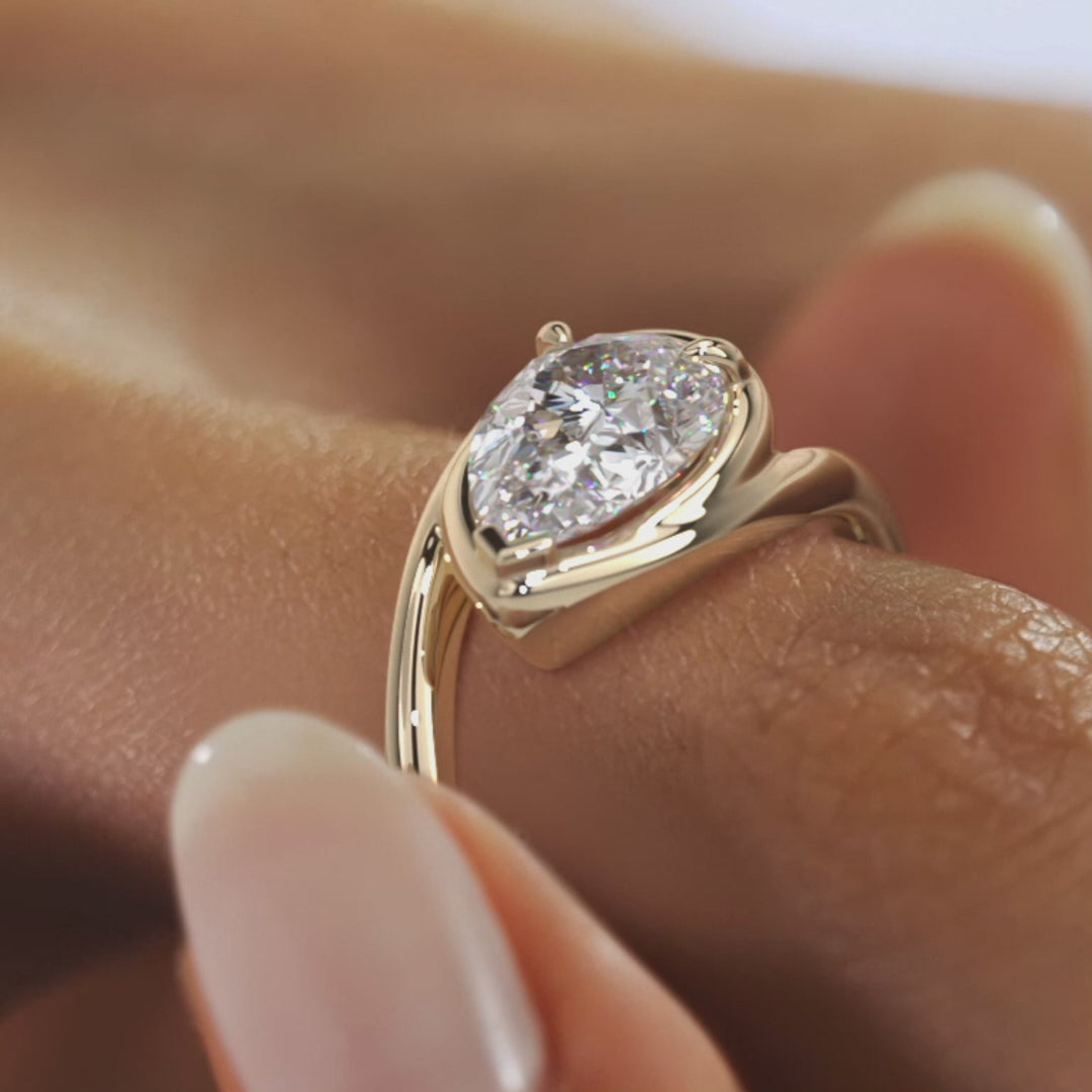 Sculptural Pear Bypass Engagement Ring