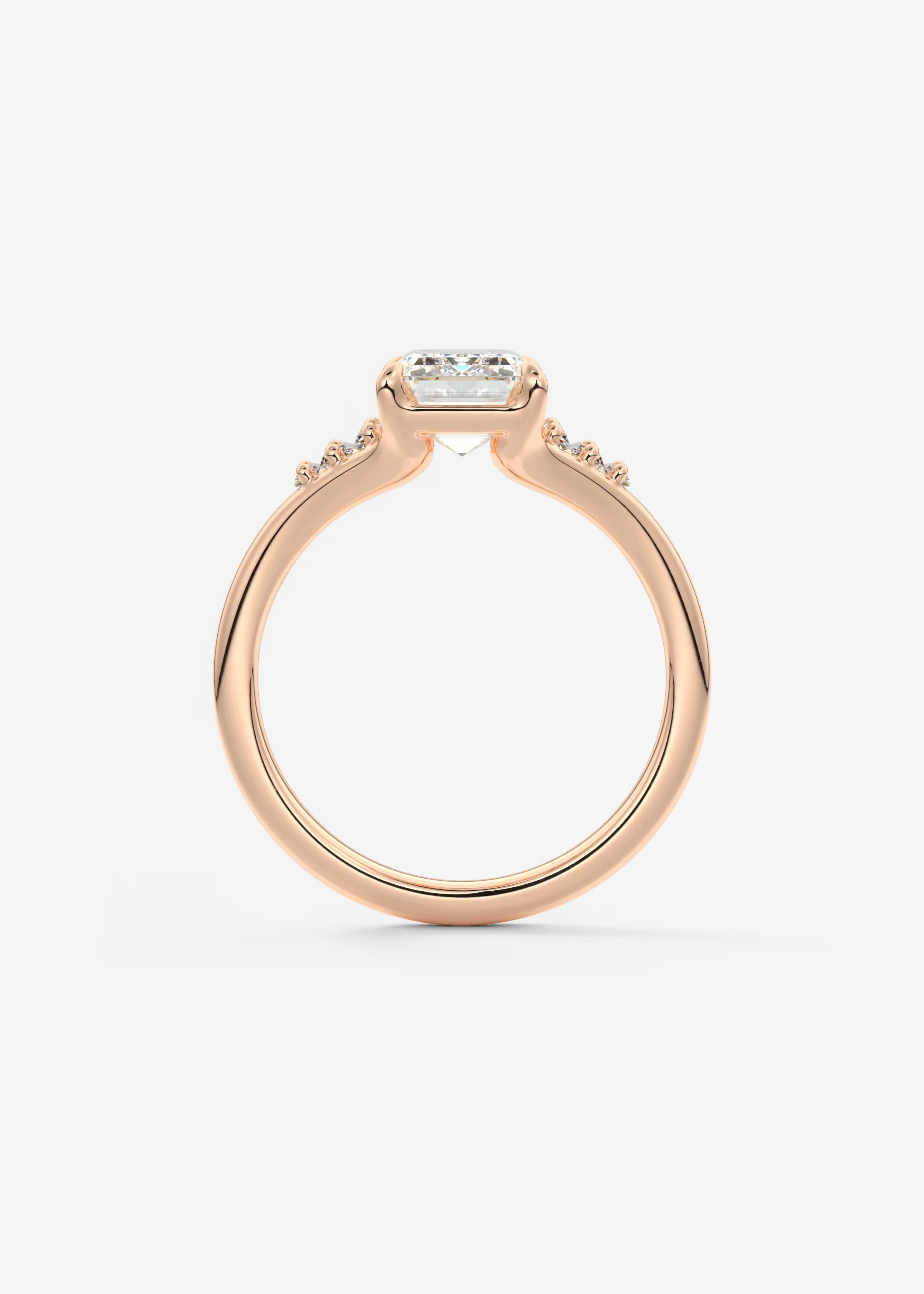 Emerald & Baguette Three Stone Split Shank Engagement Ring