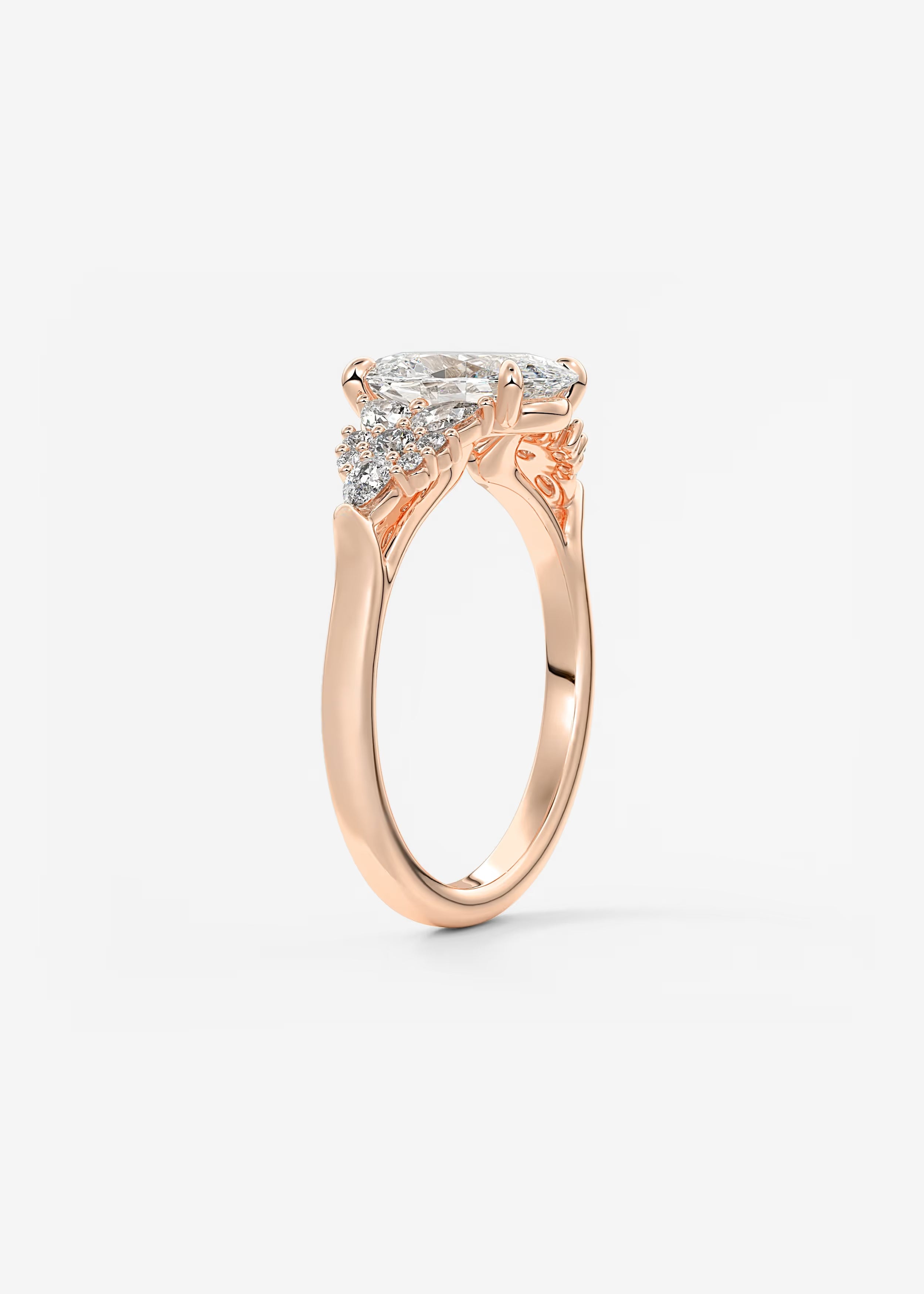 Nature Inspired Oval Engagement Ring with Clustered Diamond Accents