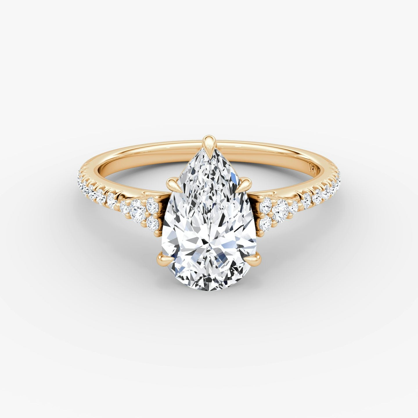 The Side Cluster Cathedral Pear Engagement Ring