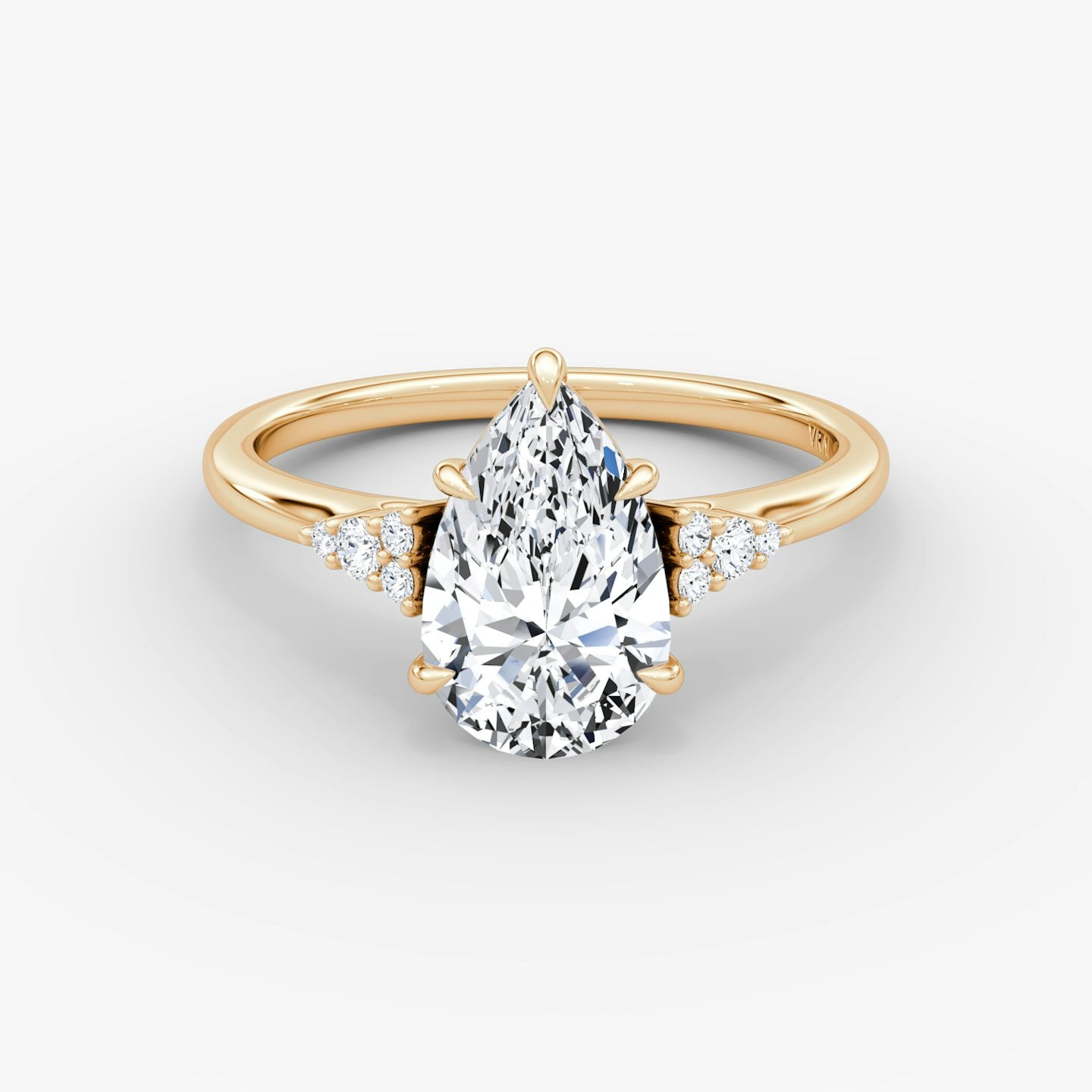 The Side Cluster Cathedral Pear Engagement Ring