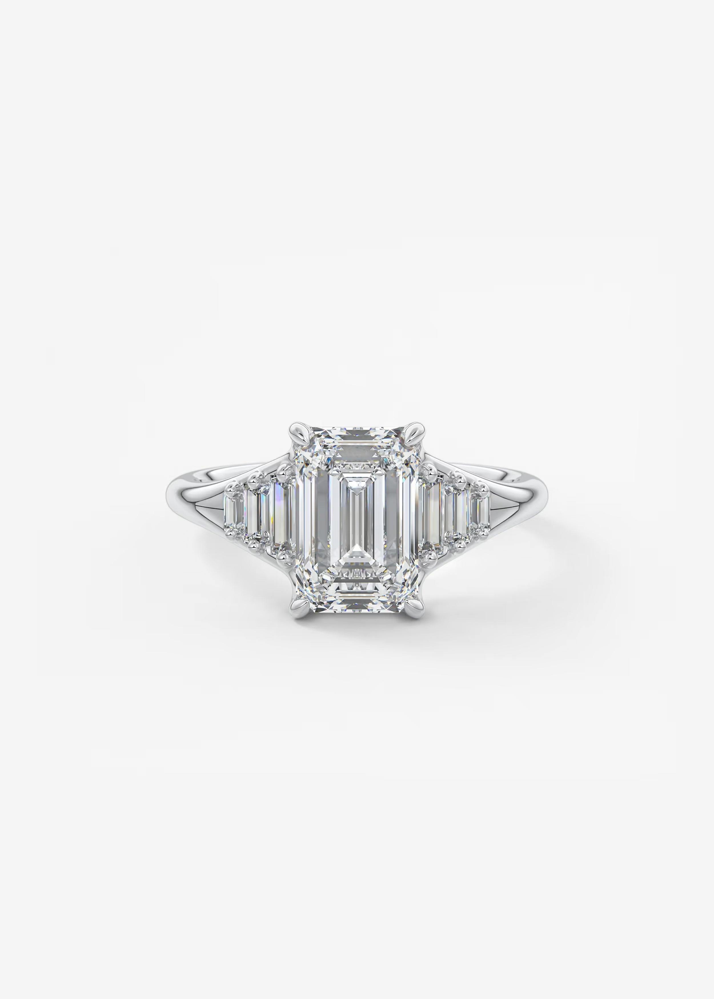 Emerald & Baguette Three Stone Split Shank Engagement Ring