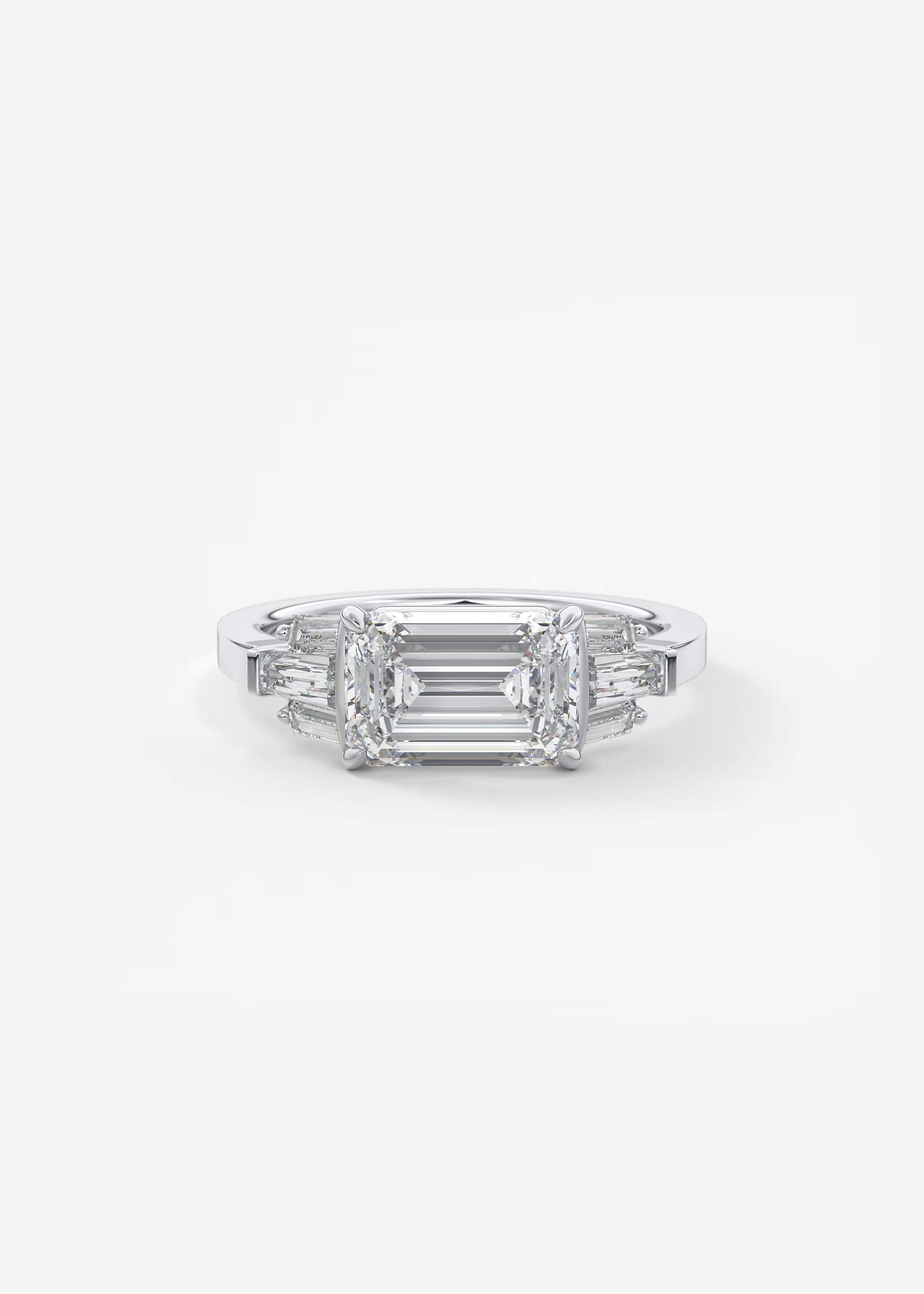 East West Emerald Cut Seven Stone Engagement Ring with Baguette Diamond Accents