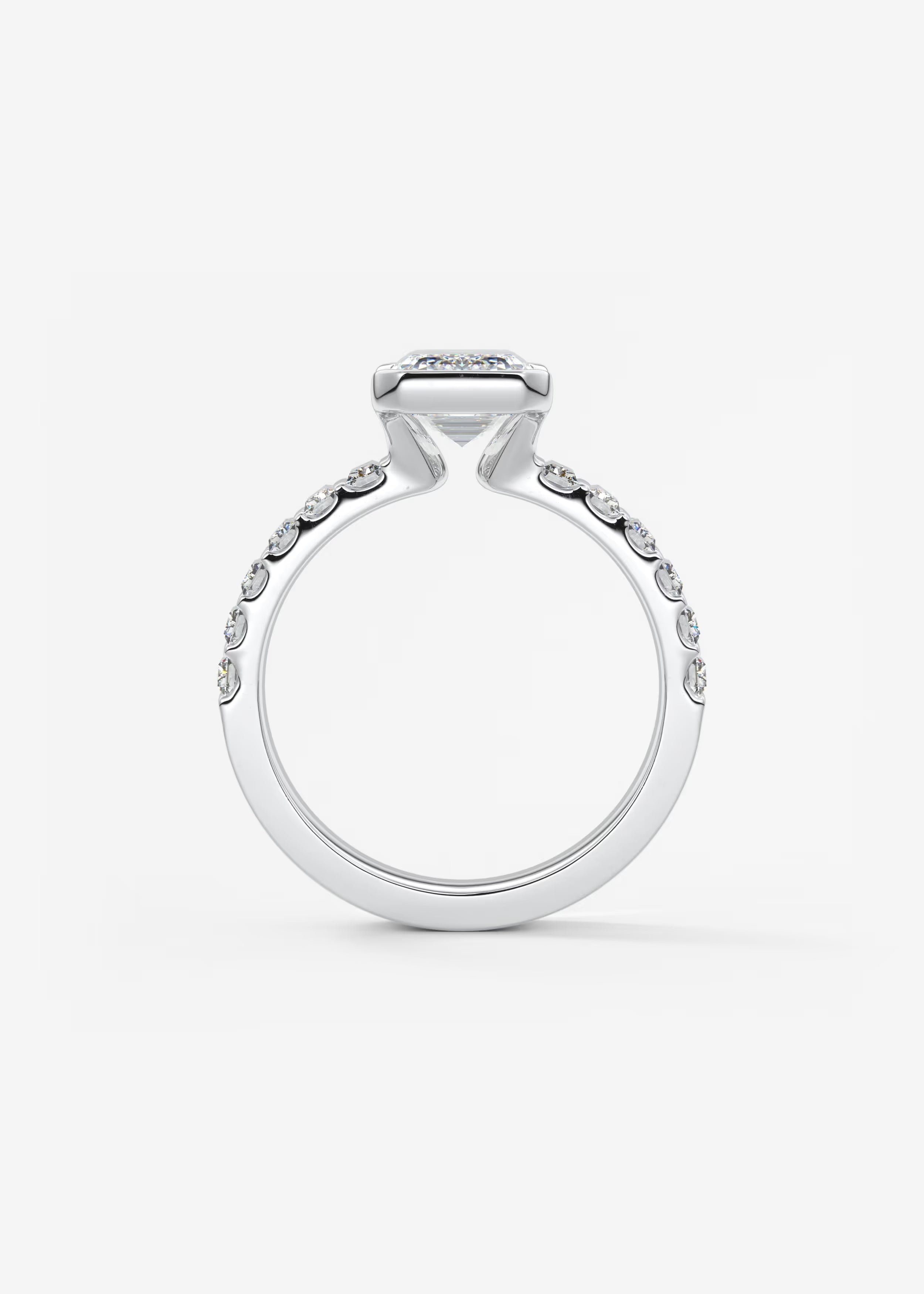 Emerald Cut Half Bezel Engagement Ring with Baguette Cut Diamond Band