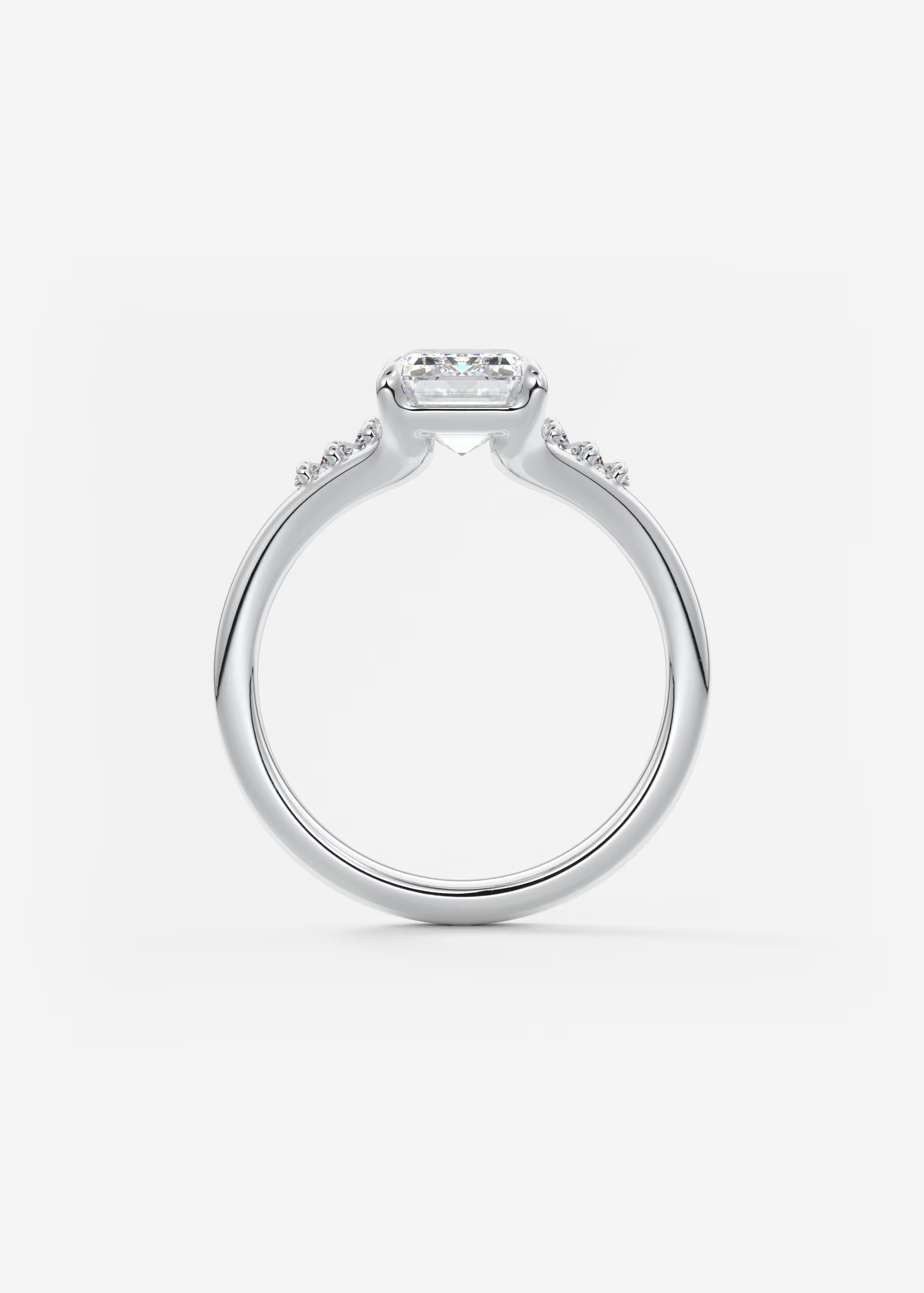 Emerald & Baguette Three Stone Split Shank Engagement Ring