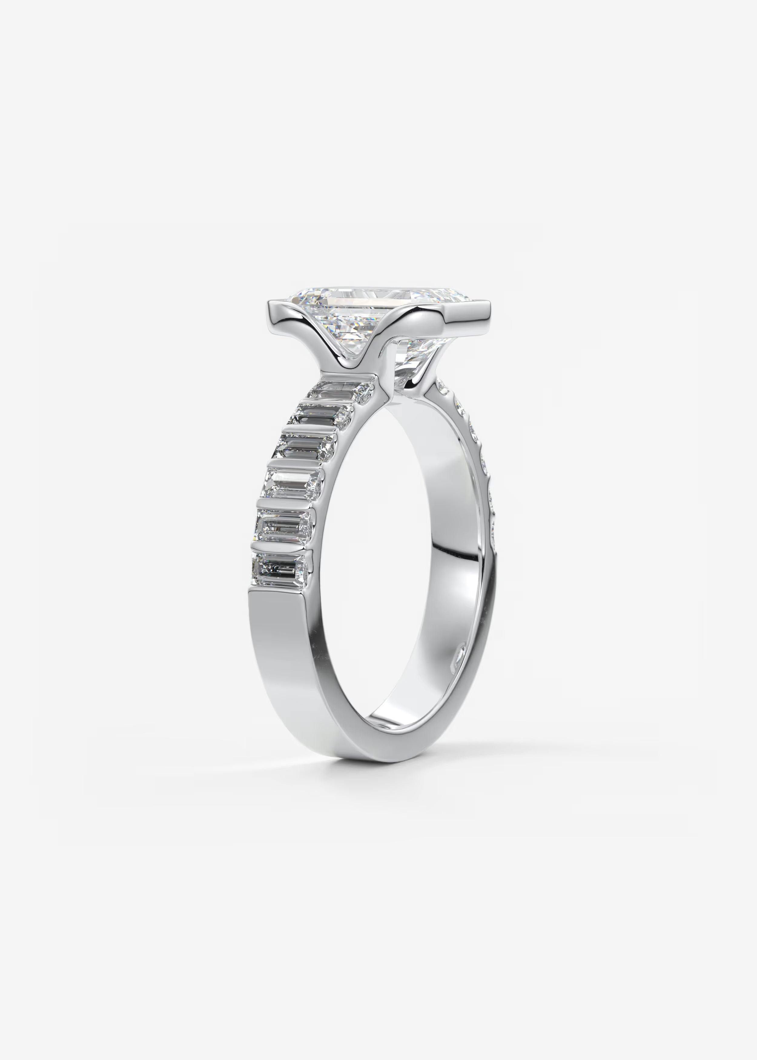 Emerald Cut Half Bezel Engagement Ring with Baguette Cut Diamond Band