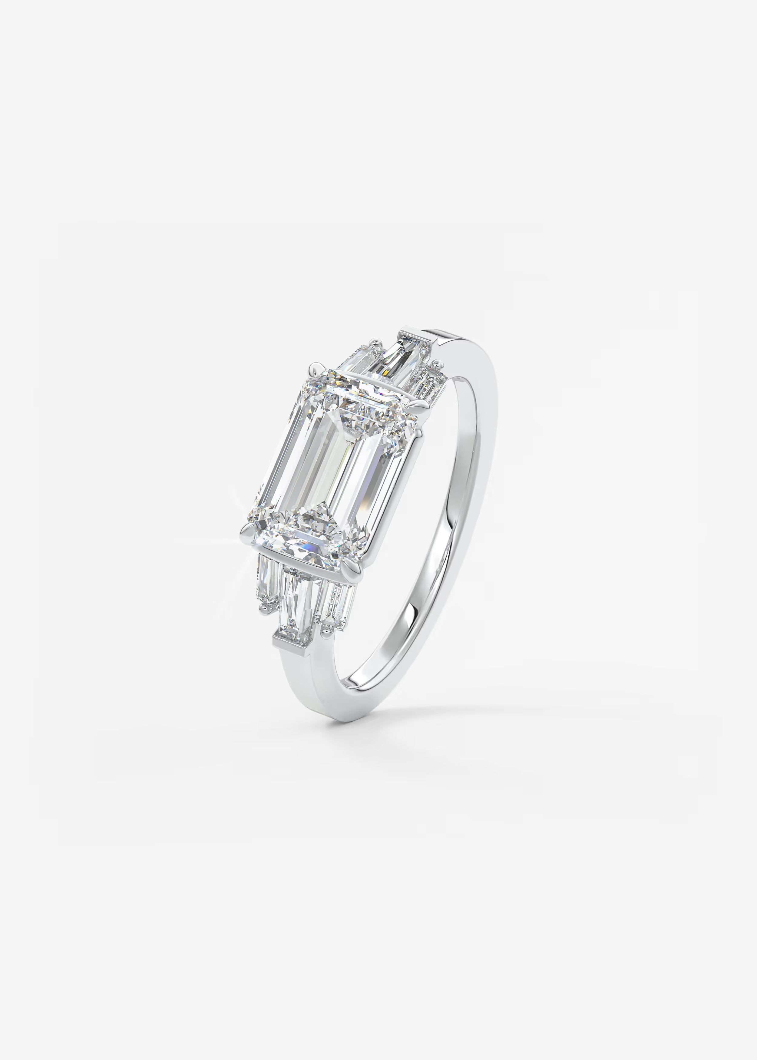 East West Emerald Cut Seven Stone Engagement Ring with Baguette Diamond Accents