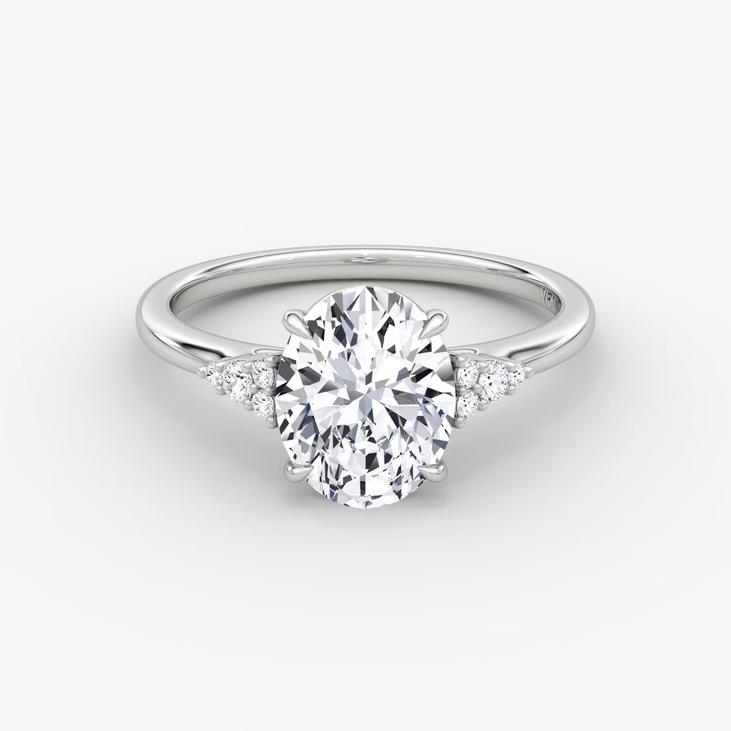 The Side Cluster Cathedral Oval Engagement Ring