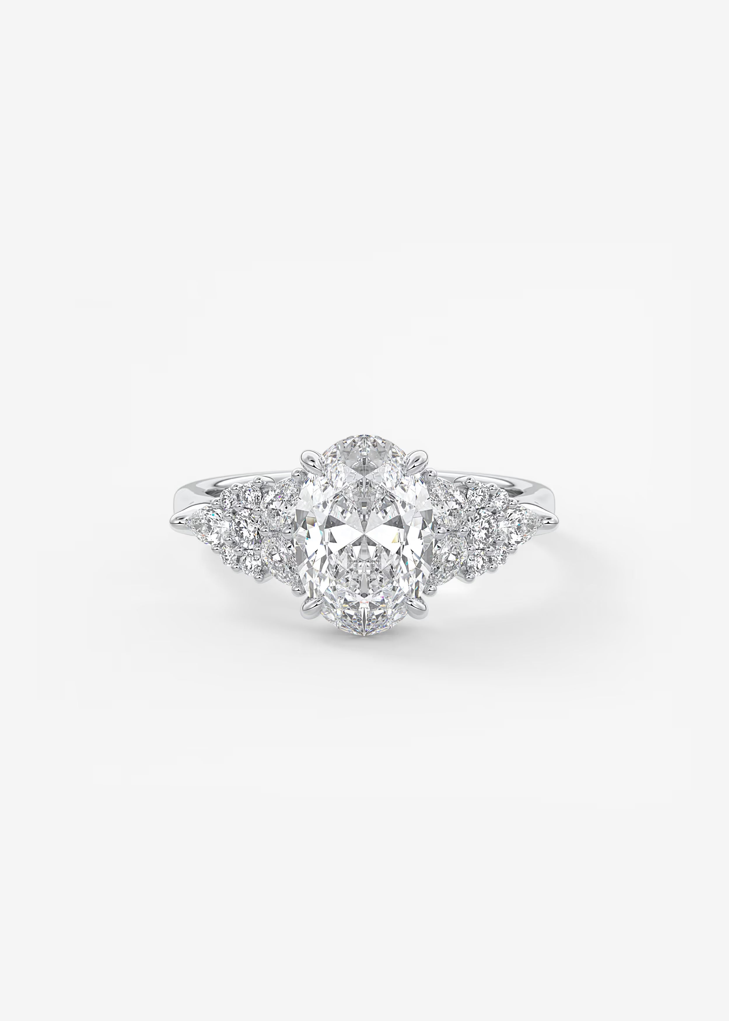 Nature Inspired Oval Engagement Ring with Clustered Diamond Accents