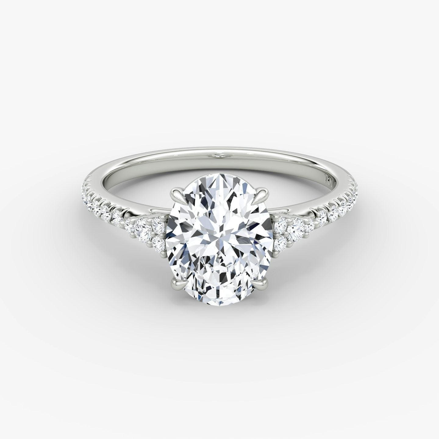 The Side Cluster Cathedral Oval Engagement Ring