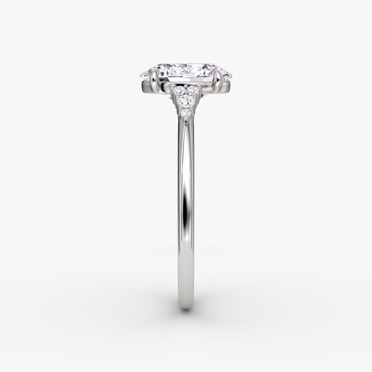 The Side Cluster Cathedral Oval Engagement Ring