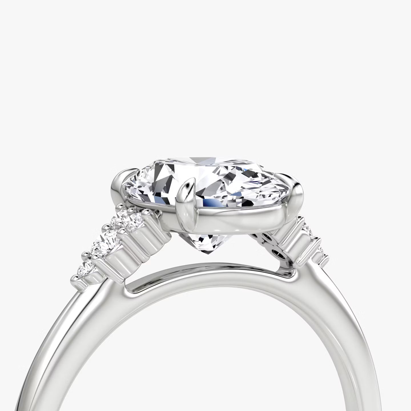 The Side Cluster Cathedral Oval Engagement Ring