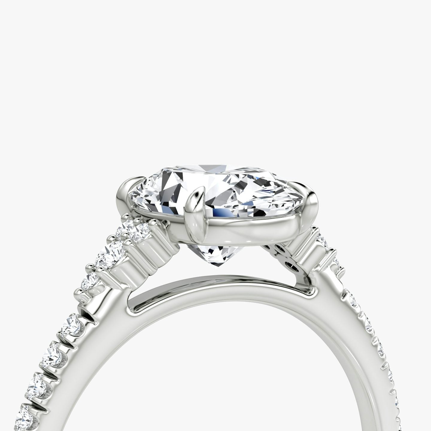 The Side Cluster Cathedral Oval Engagement Ring