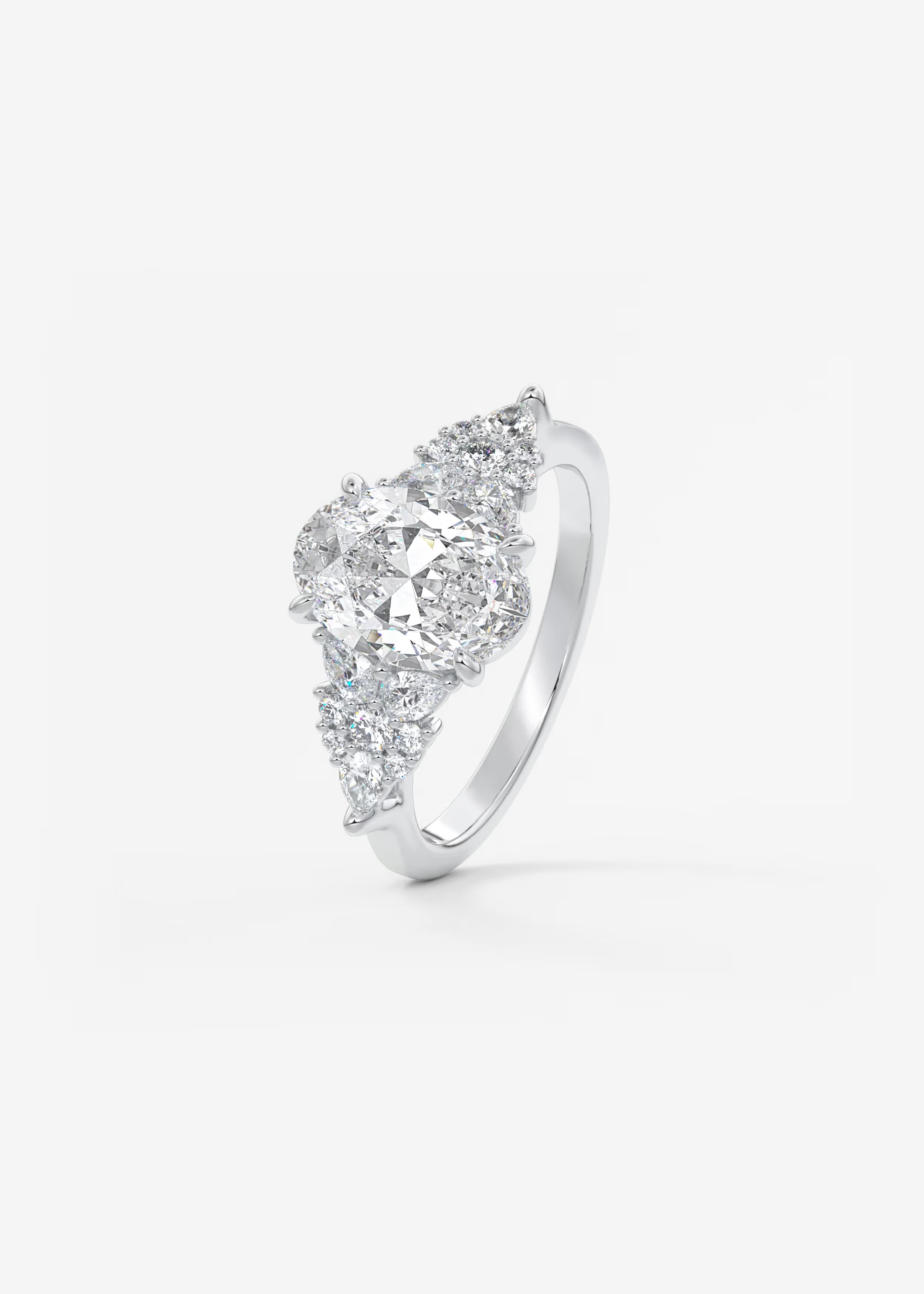 Nature Inspired Oval Engagement Ring with Clustered Diamond Accents