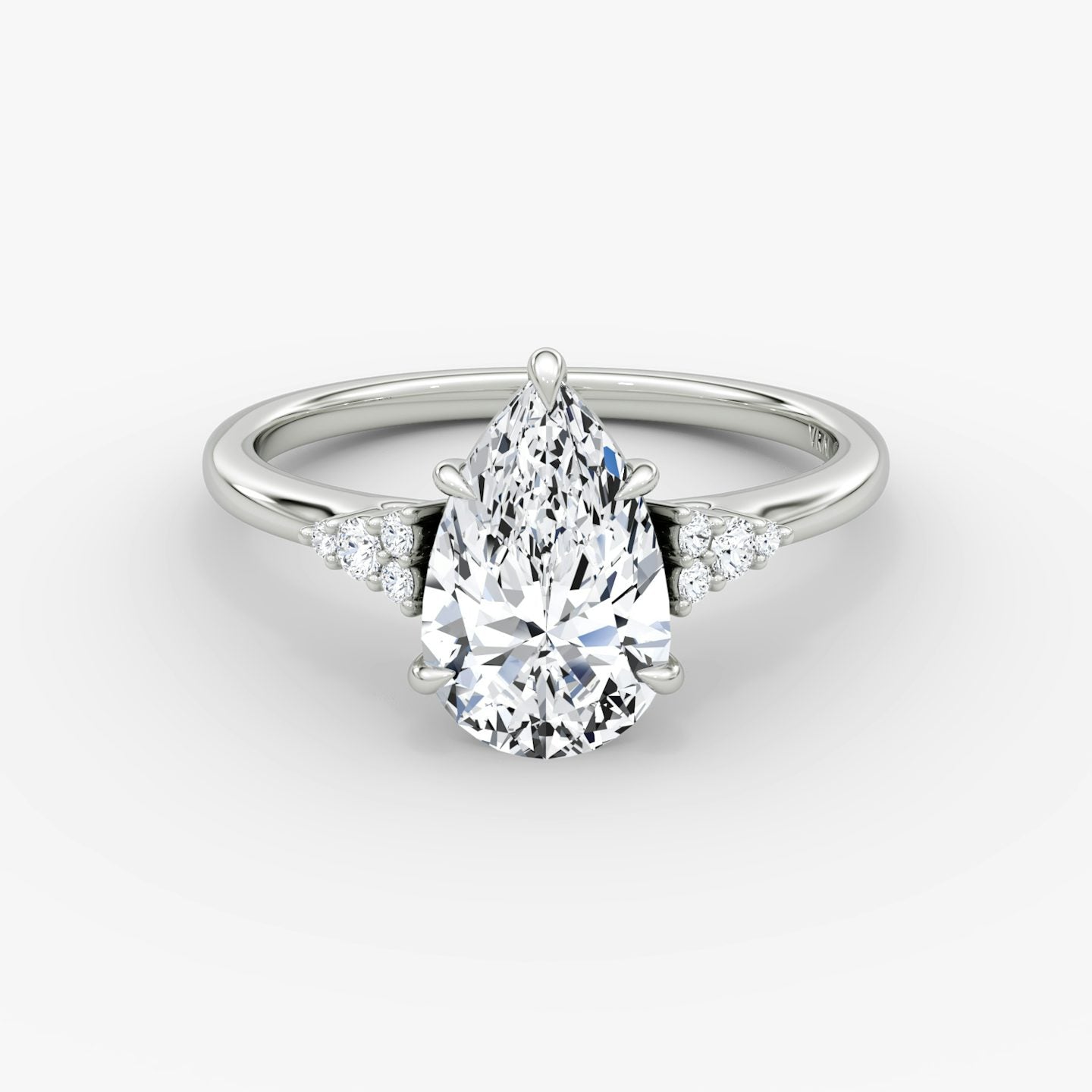 The Side Cluster Cathedral Pear Engagement Ring
