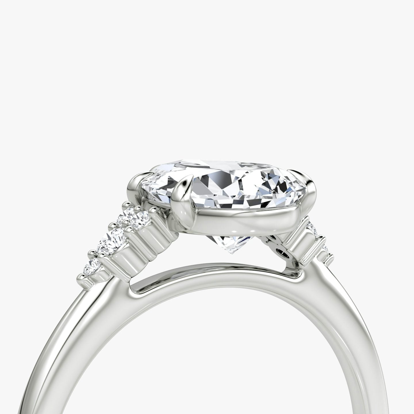 The Side Cluster Cathedral Pear Engagement Ring