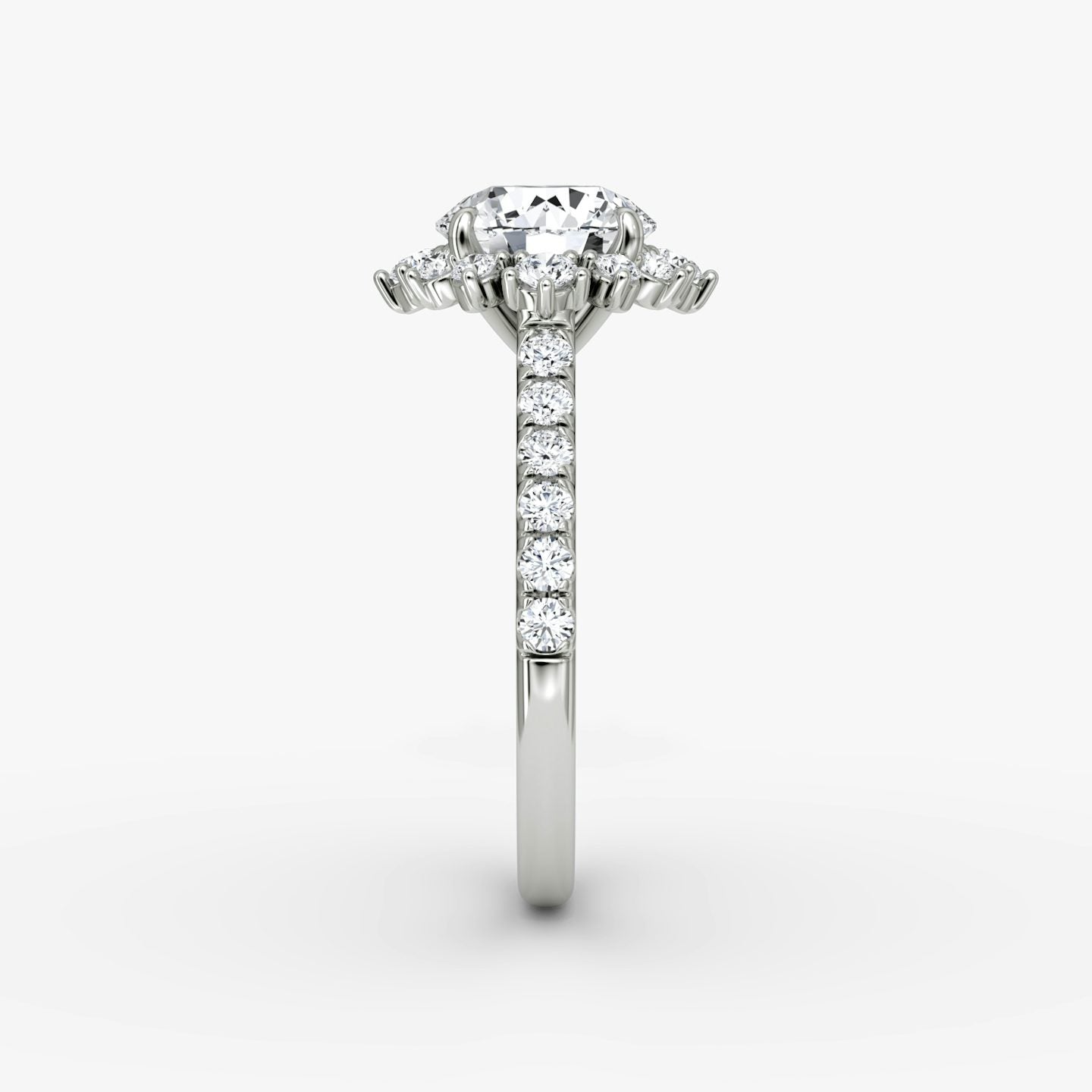 The Aurora Halo Round Brilliant Engagement Ring