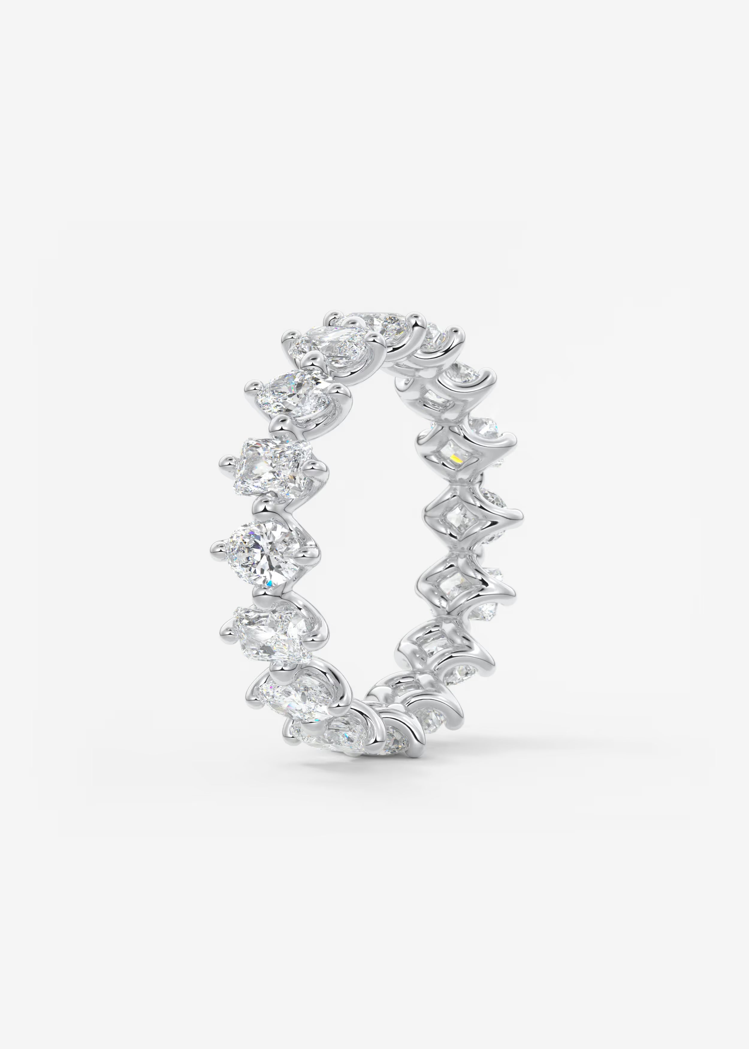 Gold Oval‑Cut Lab Diamond Eternity Band with Intricate Prong Detailing