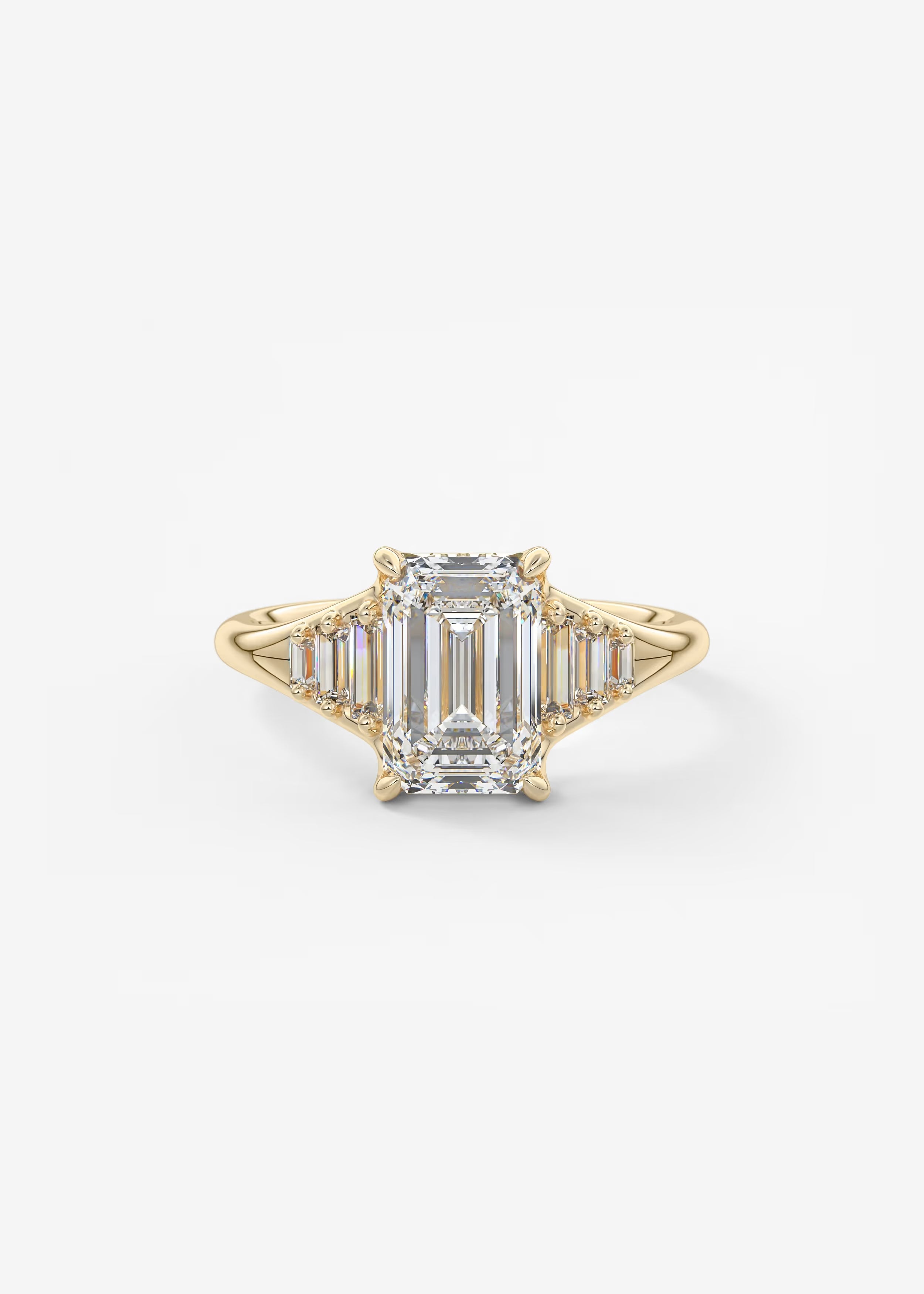 Emerald & Baguette Three Stone Split Shank Engagement Ring