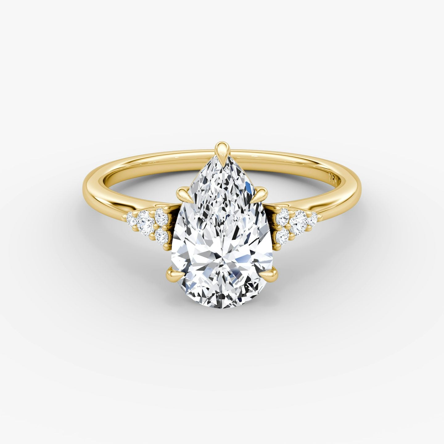 The Side Cluster Cathedral Pear Engagement Ring