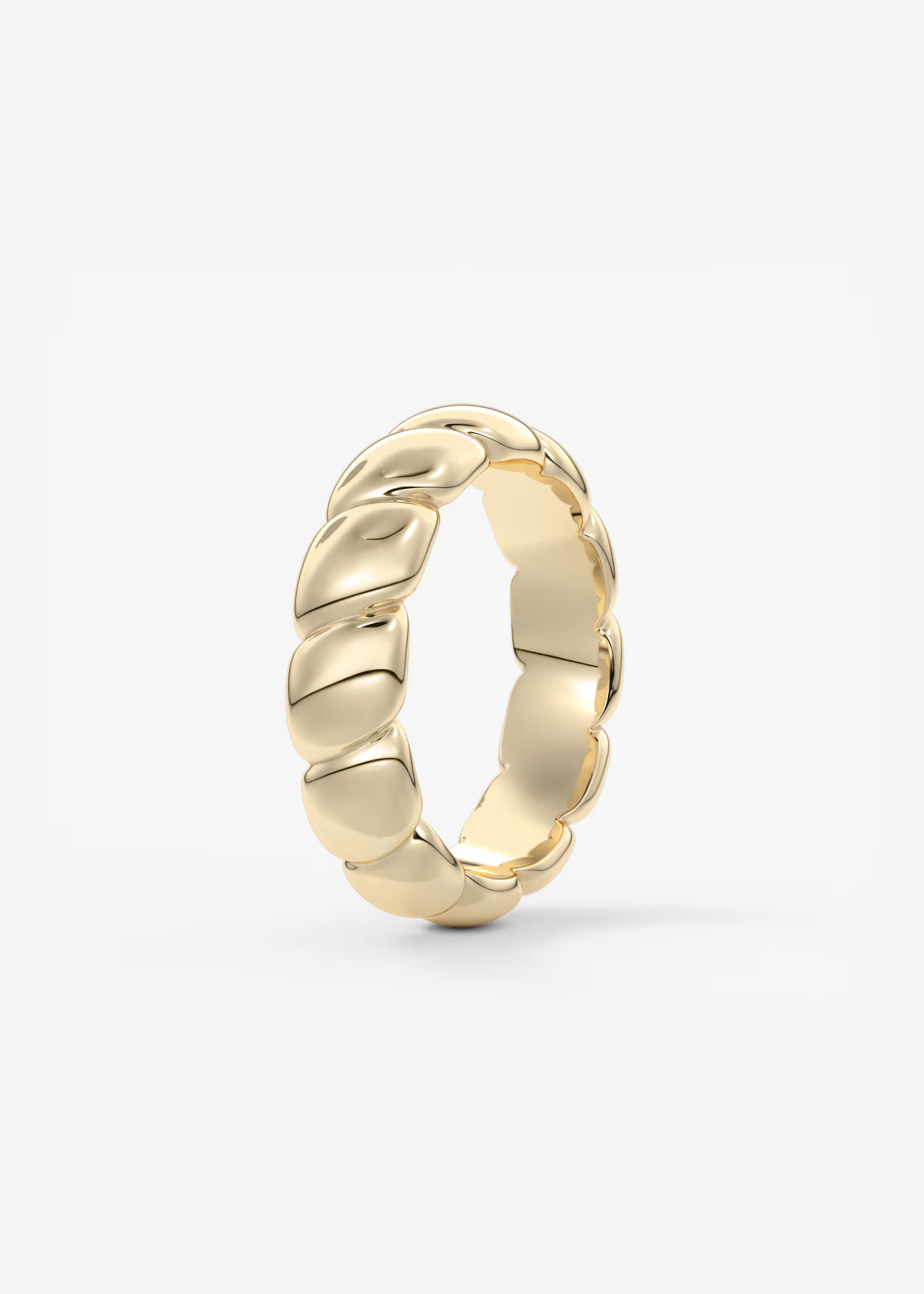 Gold Sculptural Band with Overlapping Leaf‑Inspired Design