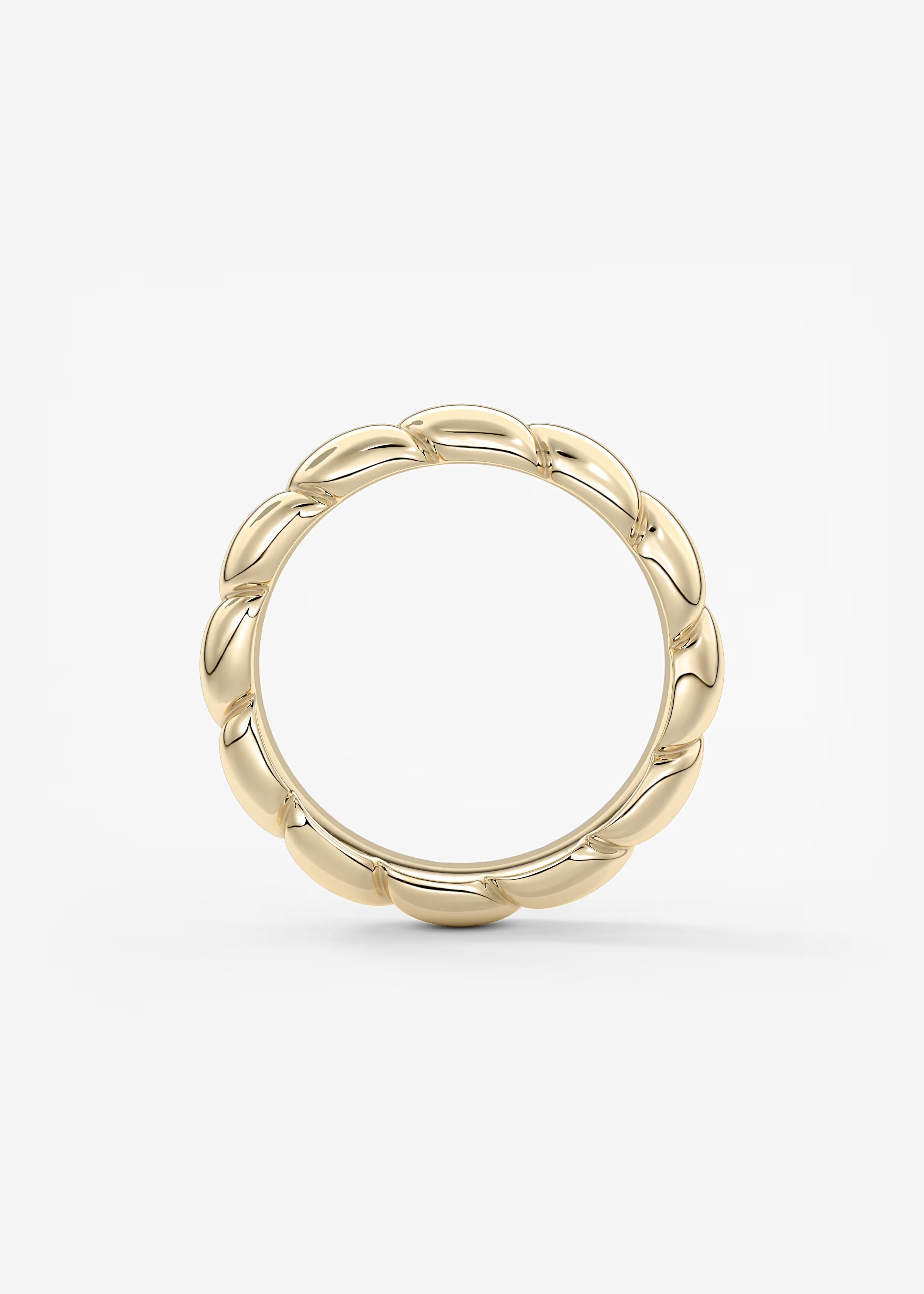 Gold Sculptural Band with Overlapping Leaf‑Inspired Design