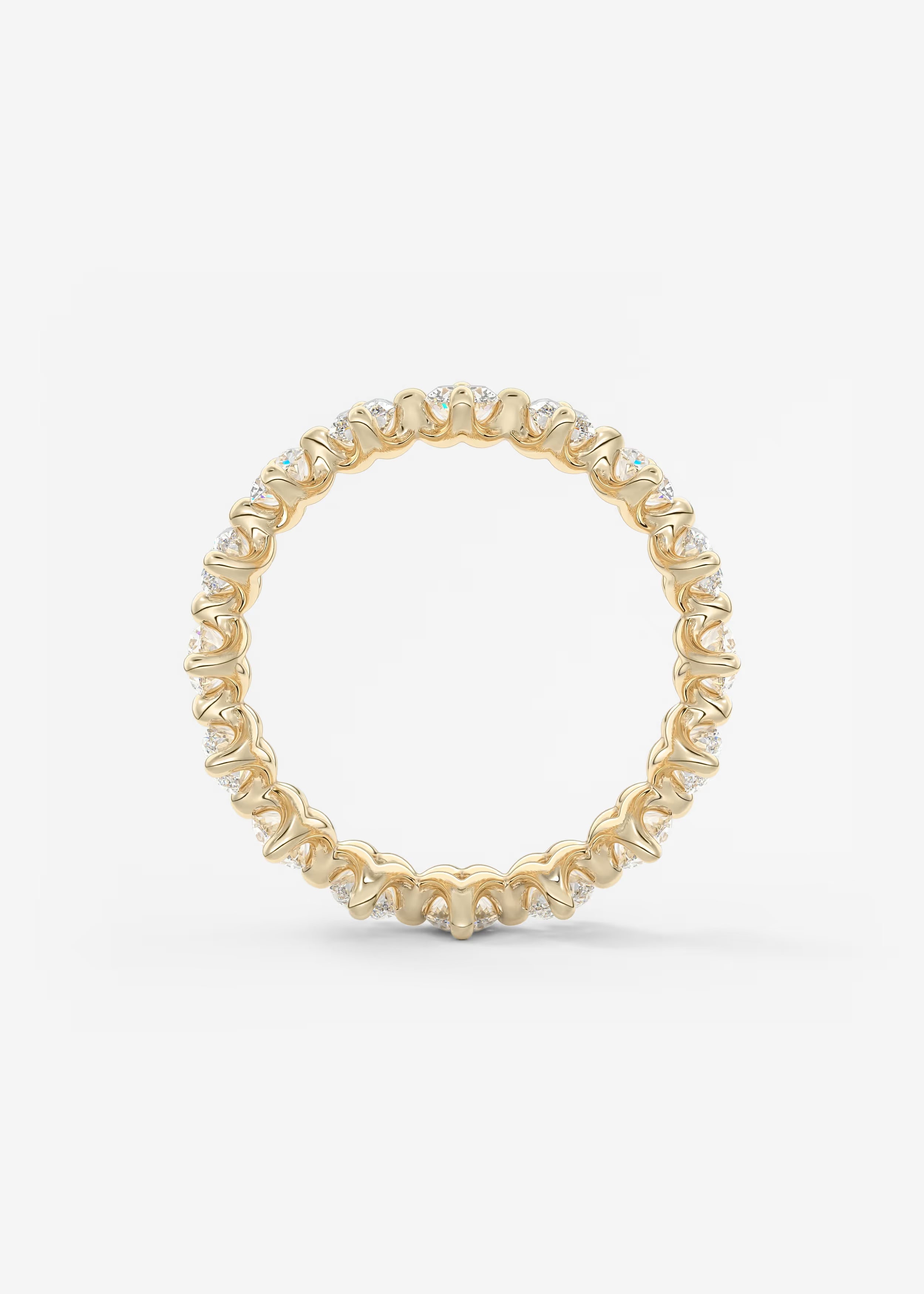 Gold Oval‑Cut Lab Diamond Eternity Band with Intricate Prong Detailing