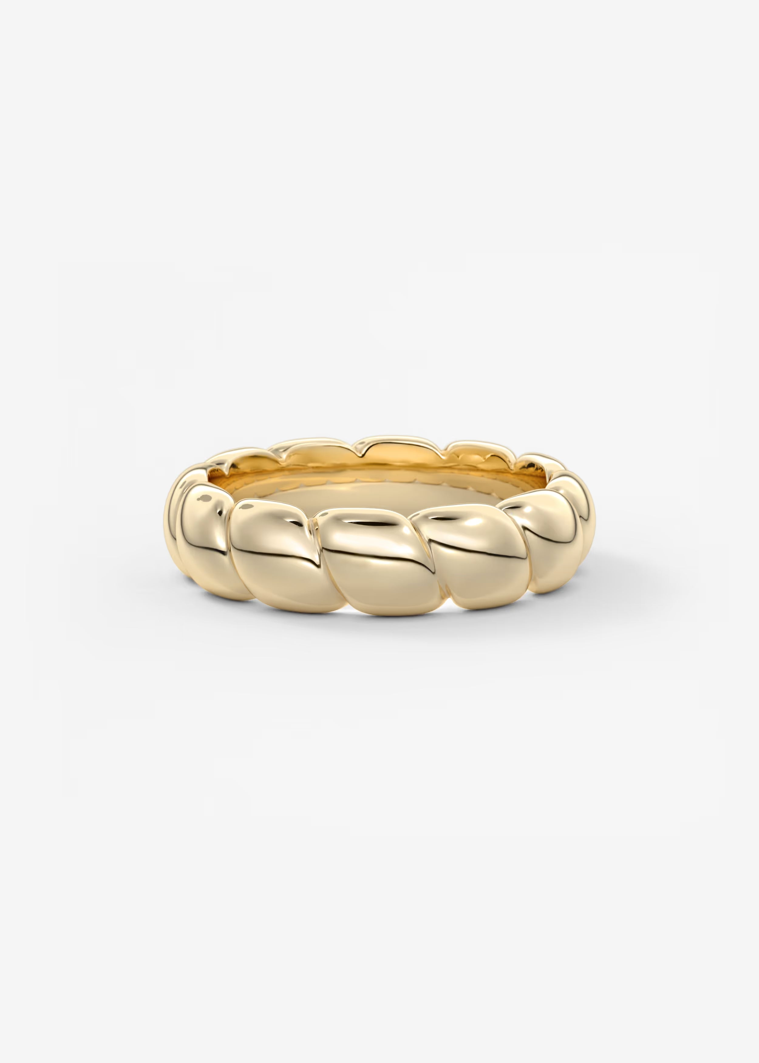 Gold Sculptural Band with Overlapping Leaf‑Inspired Design
