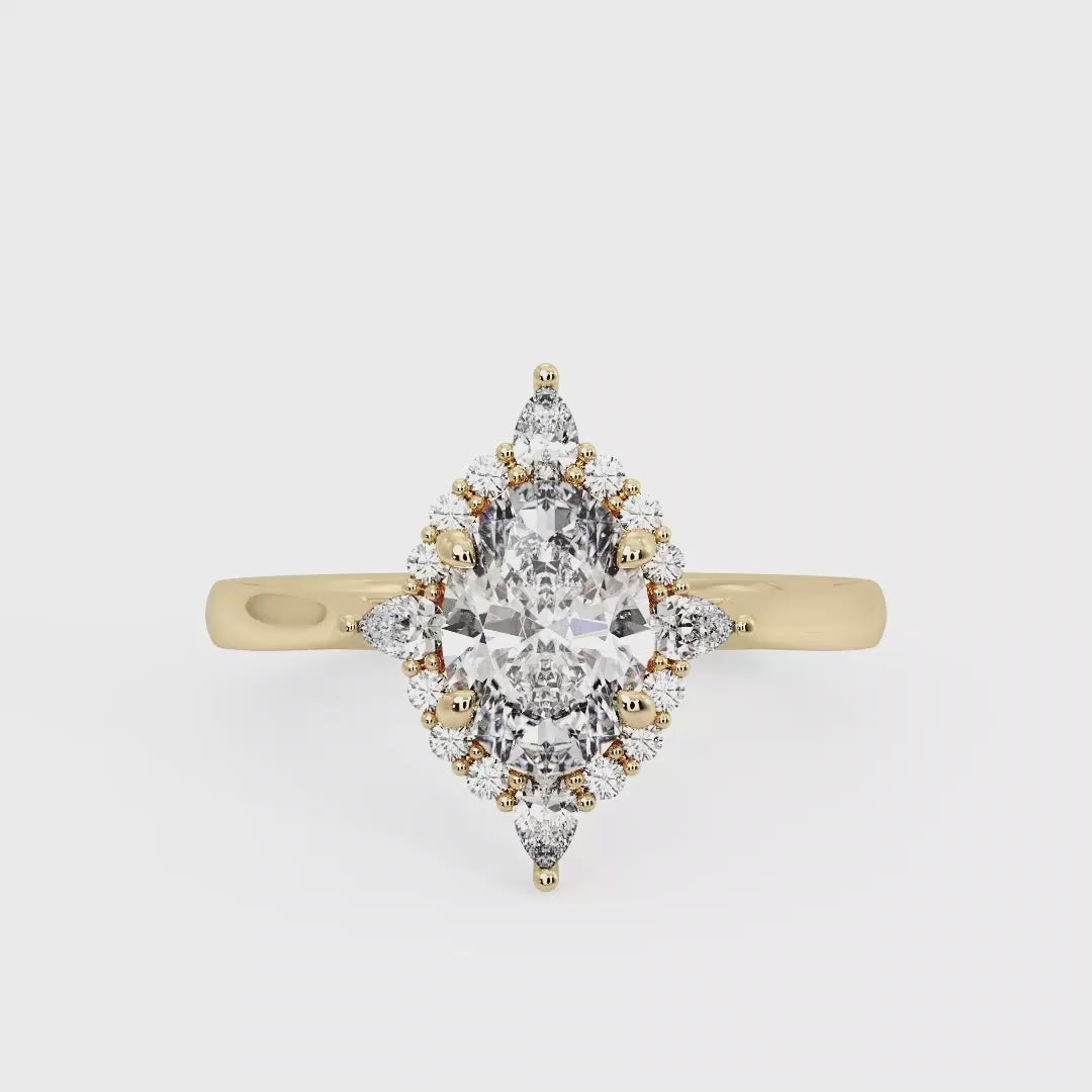 Halo-style with Pear Accents and Oval Lab Grown Diamond Center Engagement Ring