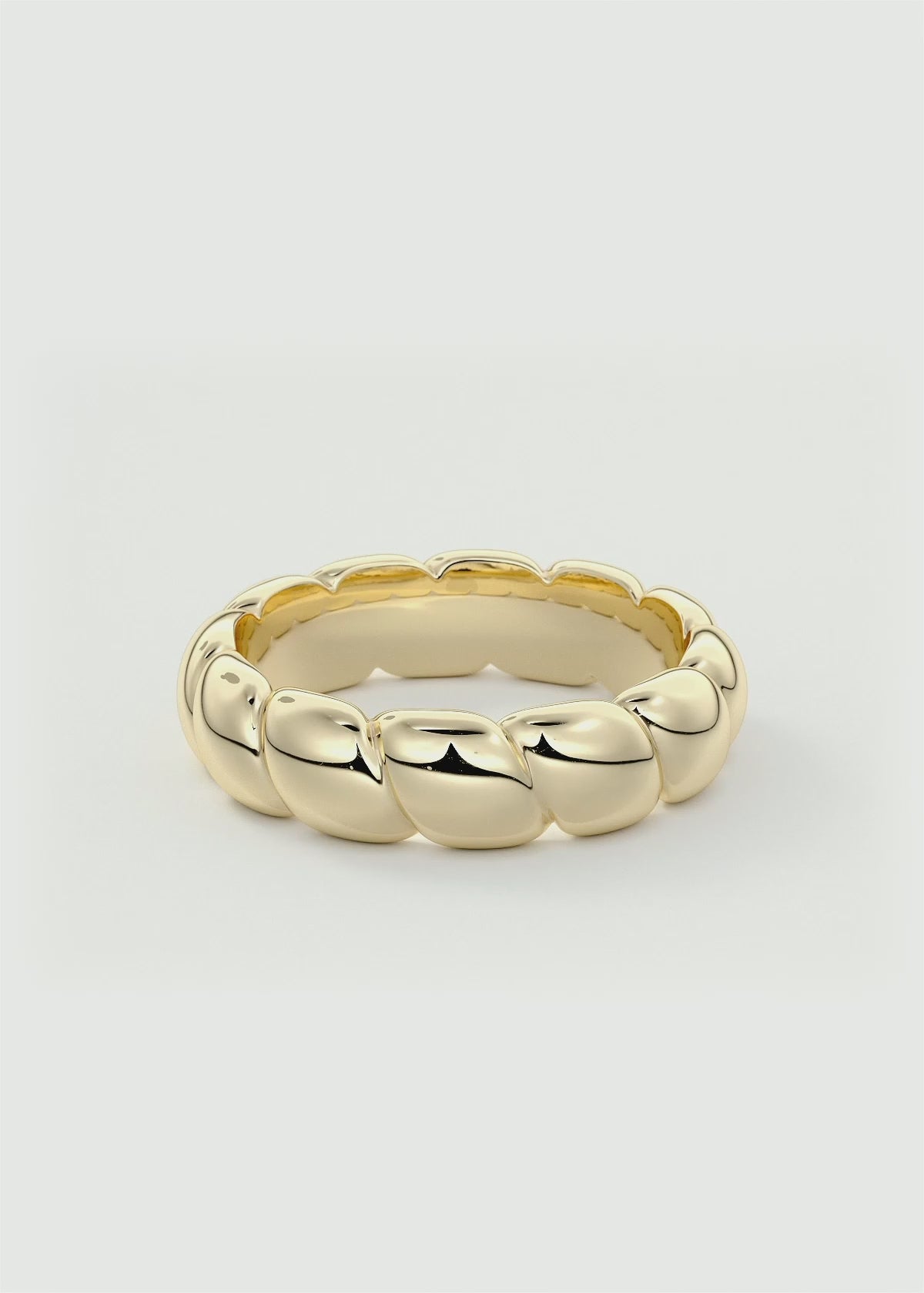 Gold Sculptural Band with Overlapping Leaf‑Inspired Design